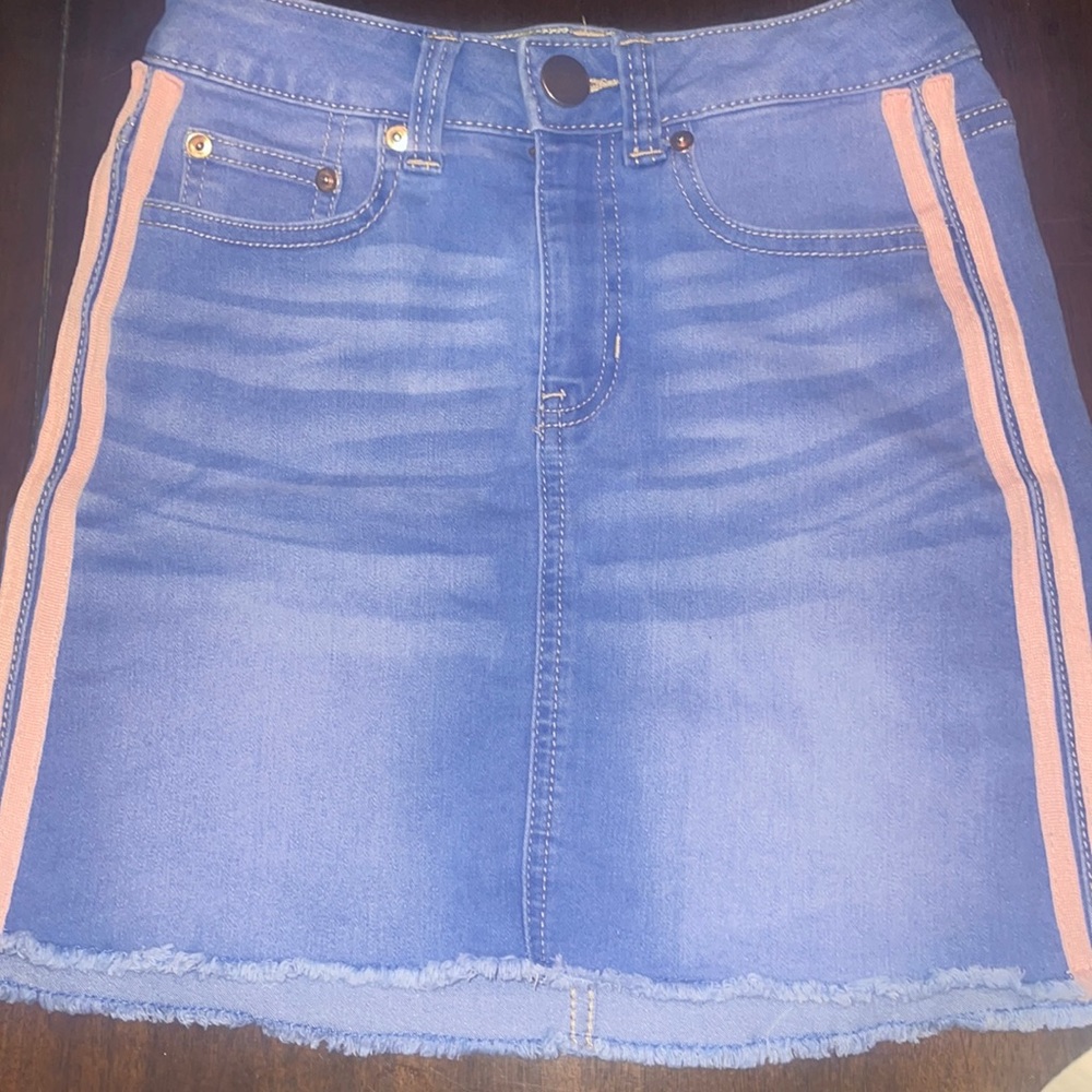 Juniors Mid rise jean skirt with pink stripes on side. Size 3.